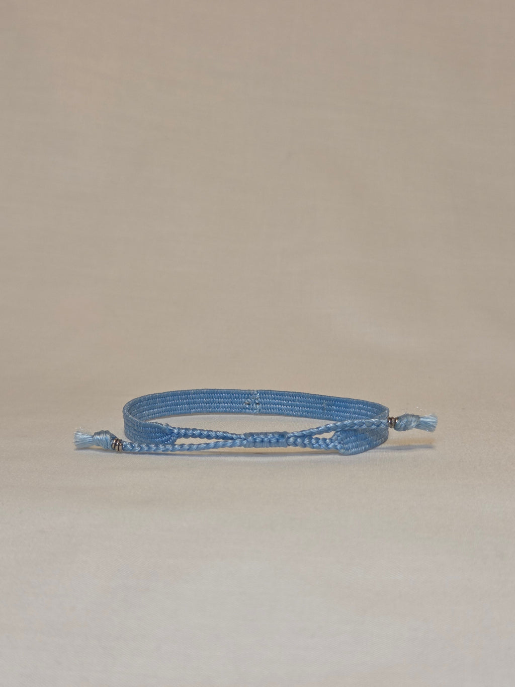 One of a kind handwoven thread bracelet