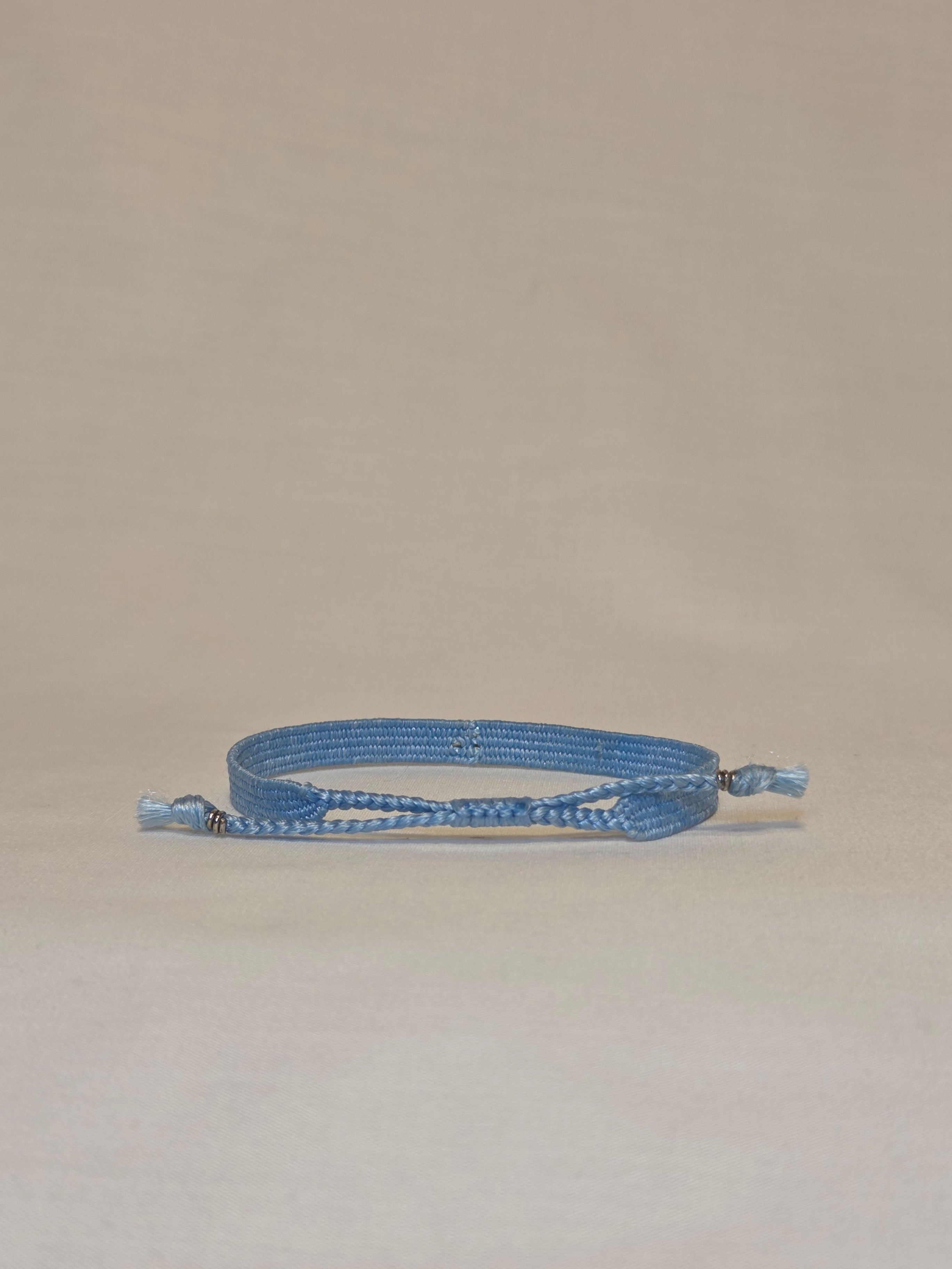 One of a kind handwoven thread bracelet